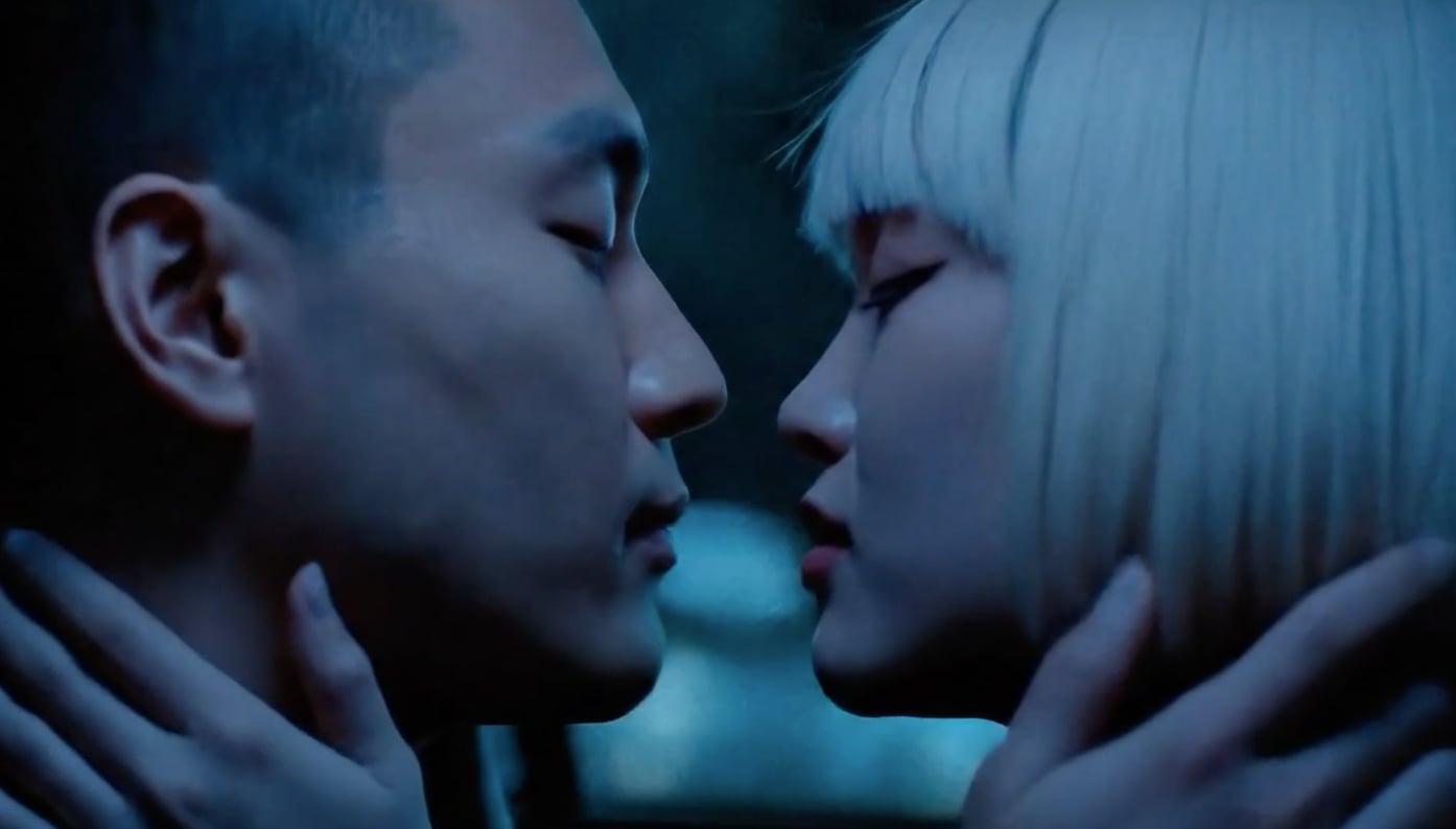 Still from the Lexus film: two faces almost touching in blue light