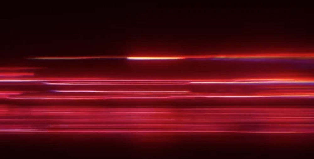 Reference still: blurred strips of red light